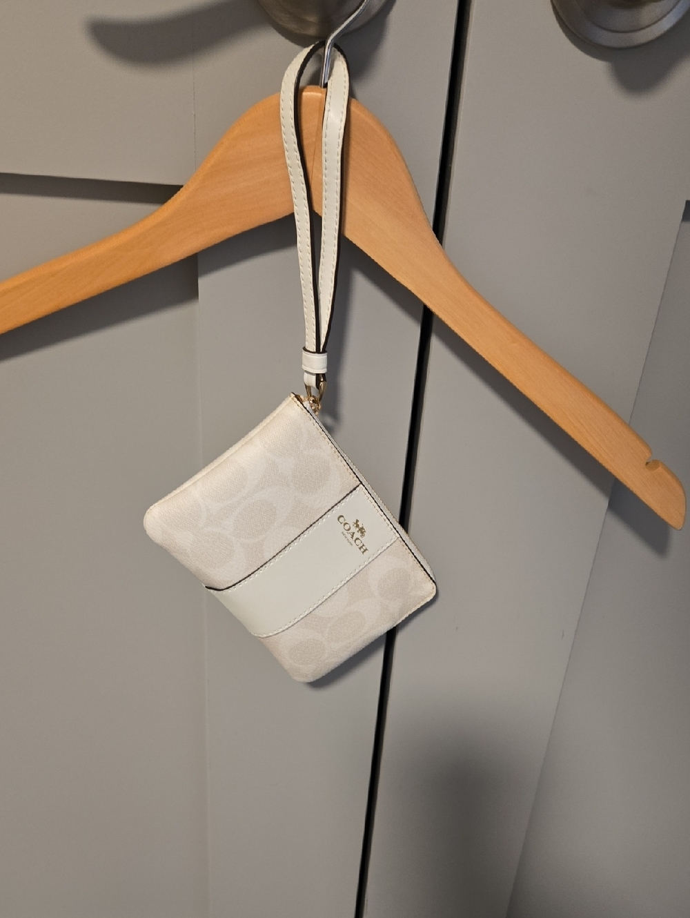 Coach Cream Signature Wristlet with Gold Logo